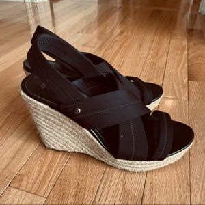 Black strappy wedges with tan soles